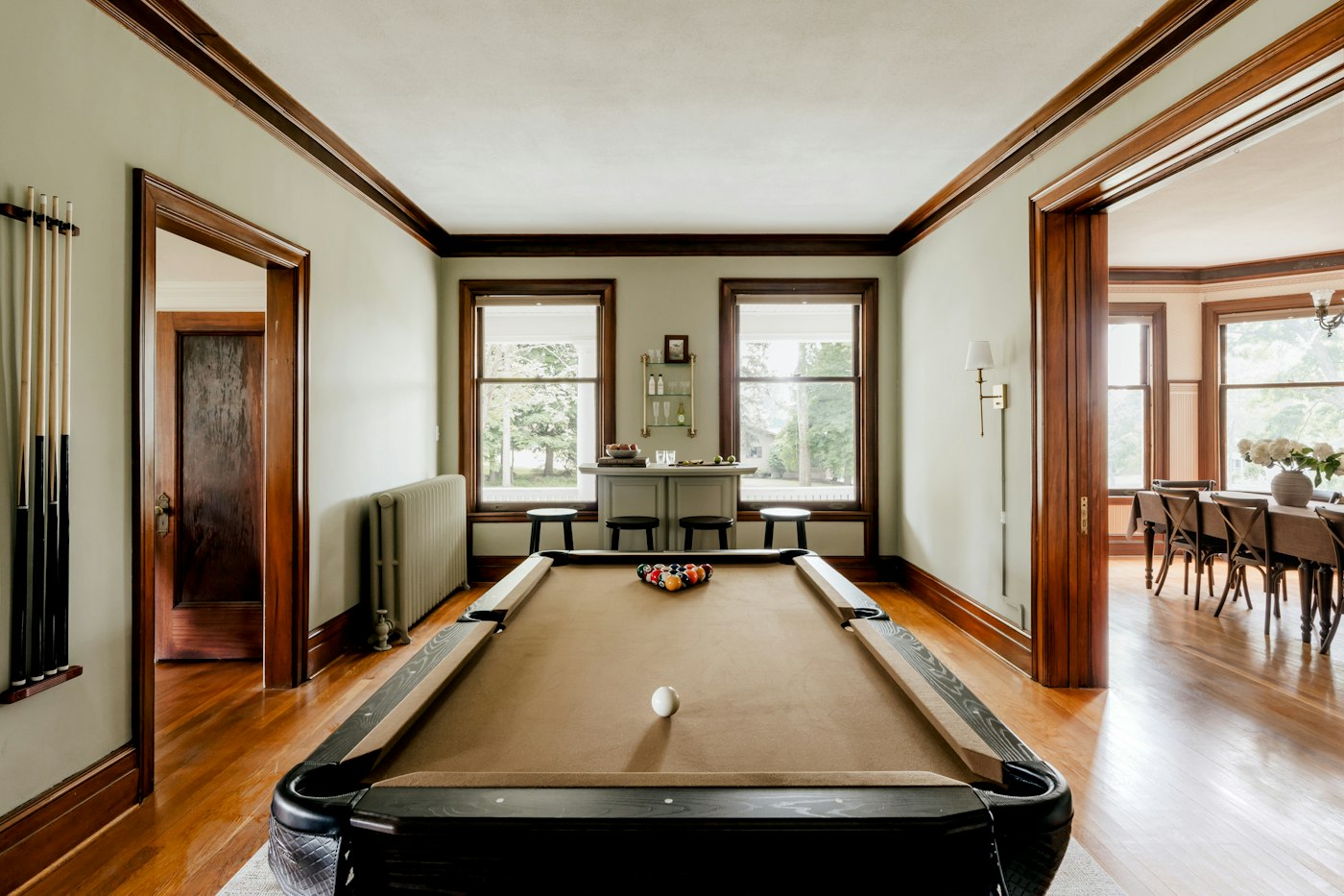Indoor games room with a billiards table, generic illustrative photo