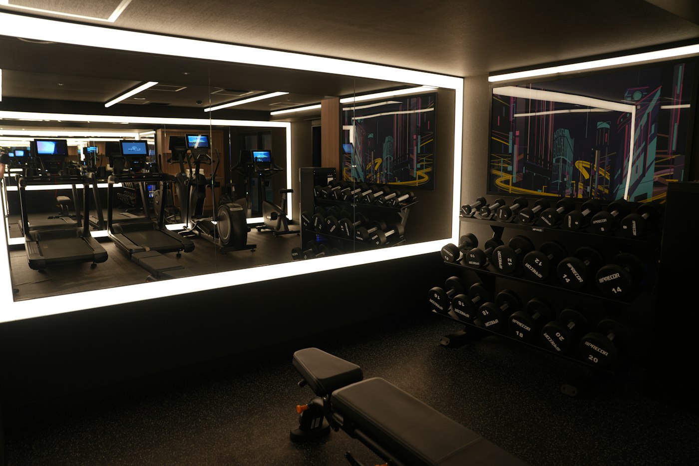 Modern gymnasium interior with treadmills and free weights, generic illustrative photo